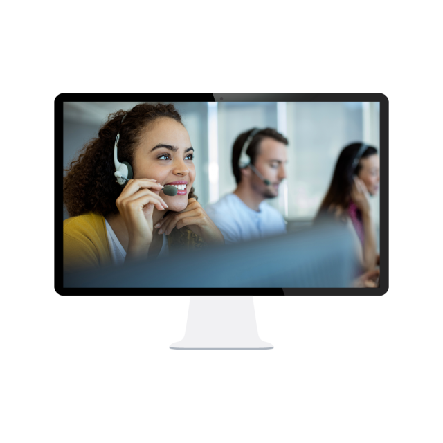 Several employees in a room with headsets on talking to people while sitting in front of computers shown on a computer screen. 